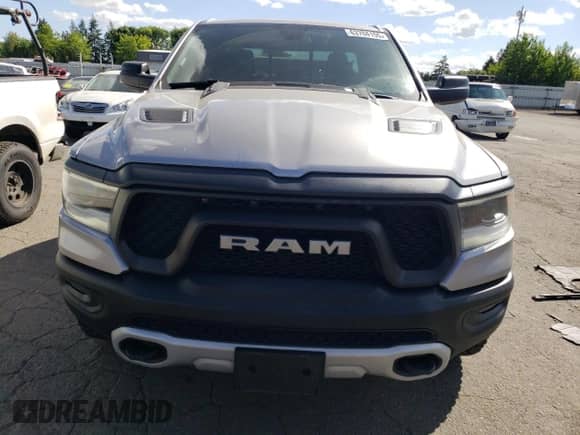 2020 Ram 1500 Rebel with VIN 1C6SRFET2LN281804, listed as a Copart auction lot 63704155 with 102,975 mi miles and Salvage title. Bid and sale history available at DreamBid. Image 5.