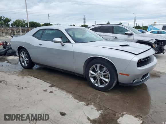 2023 Dodge Challenger SXT z VIN 2C3CDZGG6PH697032, wystawiony jako Copart lot #80696645 z przebiegiem 36 885 mil mil oraz Czysty tytuł • Clean title. Historia ofert i sprzedaży dostępna na DreamBid. Obrazek 4.
