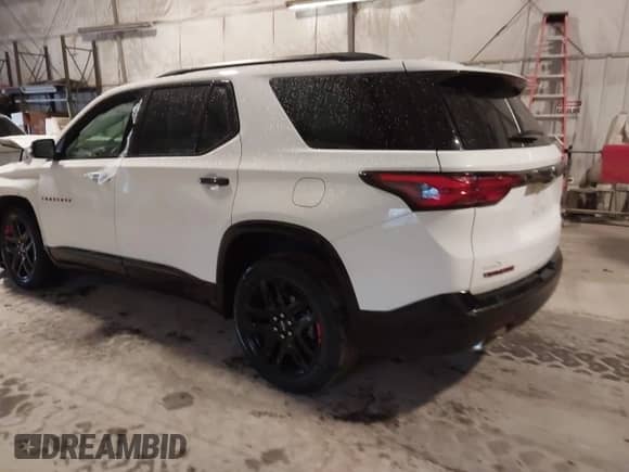 2023 Chevrolet Traverse Premier with VIN 1GNEVKKW4PJ133747, listed as a IAAI auction lot 41931340 with 29,216 mi miles and . Bid and sale history available at DreamBid. Image 3.