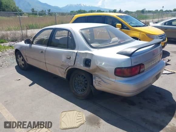 1995 Toyota Camry LE z VIN 4T1GK12E7SU112793, wystawiony jako IAAI lot #42368639 z przebiegiem 270 028 mil mil oraz . Historia ofert i sprzedaży dostępna na DreamBid. Obrazek 3.