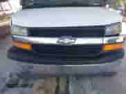 2005 Chevrolet Express Passenger z VIN 1GNFG15X151106869, wystawiony jako IAAI lot #42757318 z przebiegiem 102 844 mil mil oraz . Historia ofert i sprzedaży dostępna na DreamBid. Obrazek 13.