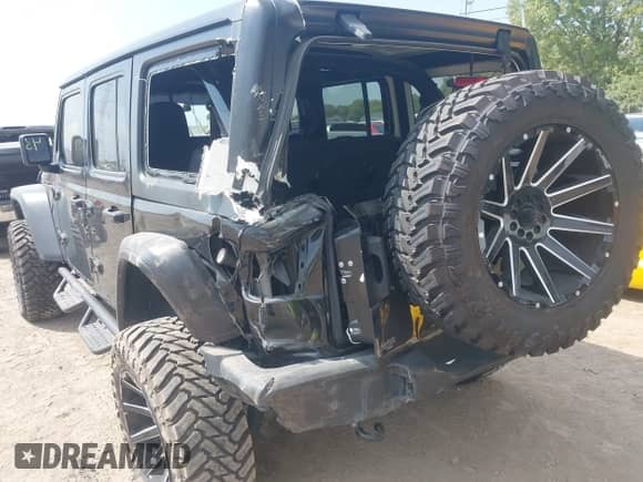 2021 Jeep Wrangler Unlimited 80th Anniversary with VIN 1C4HJXDG6MW662281, listed as a IAAI auction lot 43194178 with 52,603 mi miles and . Bid and sale history available at DreamBid. Image 6.