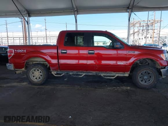 2013 Ford F-150 Lariat with VIN 1FTFW1ET5DKE88227, listed as a IAAI auction lot 43330750 with 140,077 mi miles and . Bid and sale history available at DreamBid. Image 14.