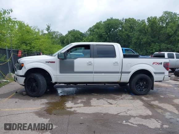 2013 Ford F-150 XL with VIN 1FTFW1EF3DFC74422, listed as a IAAI auction lot 42628205 with 258,733 mi miles and . Bid and sale history available at DreamBid. Image 14.