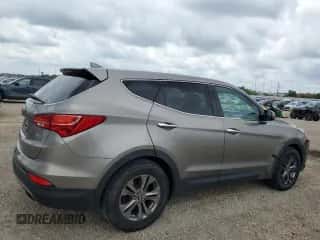 2015 Hyundai Santa Fe z VIN 5XYZT3LB0FG234784, wystawiony jako Copart lot #64021415 z przebiegiem 148 439 mil mil oraz Szkoda całkowita • Salvage title. Historia ofert i sprzedaży dostępna na DreamBid. Obrazek 3.