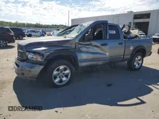 2005 Dodge 1500 SLT with VIN 1D7HU18N45J541928, listed as a Copart auction lot 69933465 with 163,579 mi miles and Salvage title. Bid and sale history available at DreamBid. Image 1.
