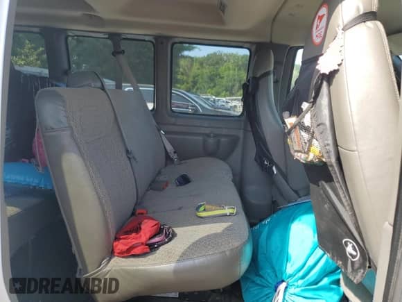 2014 Chevrolet Express Passenger LT с VIN 1GAZG1FA4E1213746, выставлен на аукционе Copart как лот 65835075 с пробегом 105 667 миль миль и Списание • Salvage title. История ставок и продаж доступна на DreamBid. Изображение 11.