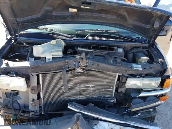 2002 Chevrolet Express с VIN 1GBFG15R521147807, выставлен на аукционе Copart как лот 77610514 с пробегом Не указан миль и Списание • Salvage title. История ставок и продаж доступна на DreamBid. Изображение 12.