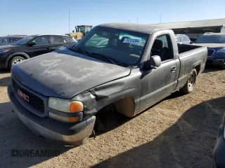 2002 GMC Sierra 1500 z VIN 1GTEC14W92Z280310, wystawiony jako Copart lot #74731204 z przebiegiem 241 075 mil mil oraz Szkoda całkowita • Salvage title. Historia ofert i sprzedaży dostępna na DreamBid. Obrazek 1.