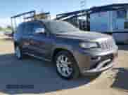 2014 Jeep Grand Cherokee Summit with VIN 1C4RJFJM6EC340672, listed as a Copart auction lot 71270735 with 49,538 mi miles and Salvage title. Bid and sale history available at DreamBid. Image 4.