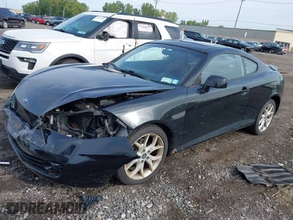 2008 Hyundai Tiburon GT с VIN KMHHN66FX8U268394, выставлен на аукционе IAAI как лот 43293640 с пробегом 66 751 миль миль и . История ставок и продаж доступна на DreamBid. Изображение 2.