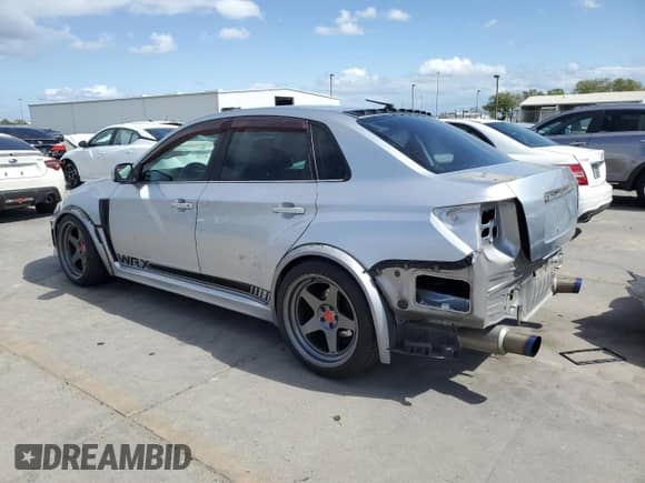 2012 Subaru WRX WRX with VIN JF1GV7E63CG019939, listed as a Copart auction lot 50739865 with 183,255 mi miles and Salvage title. Bid and sale history available at DreamBid. Image 2.