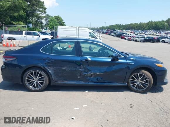 2021 Toyota Camry Hybrid XLE with VIN 4T1F31AK3MU554067, listed as a IAAI auction lot 42681018 with 53,630 mi miles and . Bid and sale history available at DreamBid. Image 13.