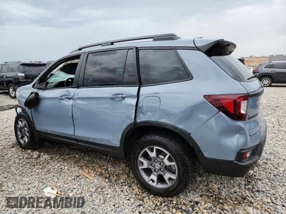 2023 Honda Passport TrailSport с VIN 5FNYF8H64PB020272, выставлен на аукционе Copart как лот 69501155 с пробегом 35 948 миль миль и Списание • Salvage title. История ставок и продаж доступна на DreamBid. Изображение 2.
