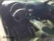 2010 Chevrolet Corvette 2LT с VIN 1G1YF2DW8A5107225, выставлен на аукционе Copart как лот 61450055 с пробегом 66 014 миль миль и Списание • Salvage title. История ставок и продаж доступна на DreamBid. Изображение 8.