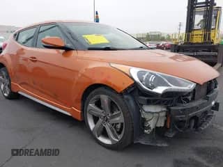 2013 Hyundai Veloster Turbo с VIN KMHTC6AE1DU128016, выставлен на аукционе IAAI как лот 42425892 с пробегом 104 209 миль миль и . История ставок и продаж доступна на DreamBid. Изображение 1.