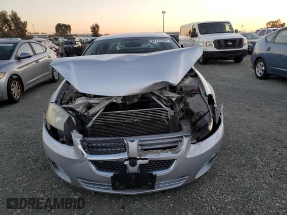 2005 Dodge Stratus with VIN 1B3EL46J25N617299, listed as a Copart auction lot 82712334 with 138,909 mi miles and Salvage title. Bid and sale history available at DreamBid. Image 5.