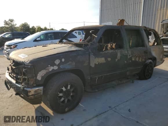 1997 Chevrolet Tahoe с VIN 1GNEK13RXVJ429428, выставлен на аукционе Copart как лот 70564004 с пробегом Не указан миль и На запчасти • Non repairable. История ставок и продаж доступна на DreamBid. Изображение 1.