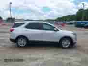 2021 Chevrolet Equinox LT with VIN 3GNAXJEV9MS161446, listed as a IAAI auction lot 42243218 with 92,451 mi miles and . Bid and sale history available at DreamBid. Image 13.