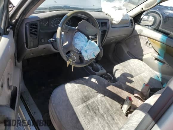 2001 Toyota Tacoma with VIN 5TENL42N61Z751733, listed as a Copart auction lot 82475265 with 283,177 mi miles and Salvage title. Bid and sale history available at DreamBid. Image 8.
