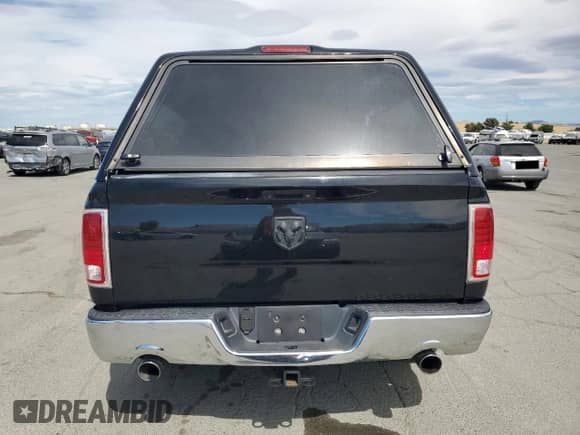 2014 Ram 1500 Laramie z VIN 1C6RR7NM9ES398863, wystawiony jako Copart lot #66007445 z przebiegiem Nie podano mil oraz Nie do naprawy • Non repairable. Historia ofert i sprzedaży dostępna na DreamBid. Obrazek 6.