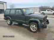 1997 Jeep Grand Cherokee with VIN 1J4FN68S3VL523954, listed as a Copart auction lot 49080415 with 196,082 mi miles and Salvage title. Bid and sale history available at DreamBid. Image 4.