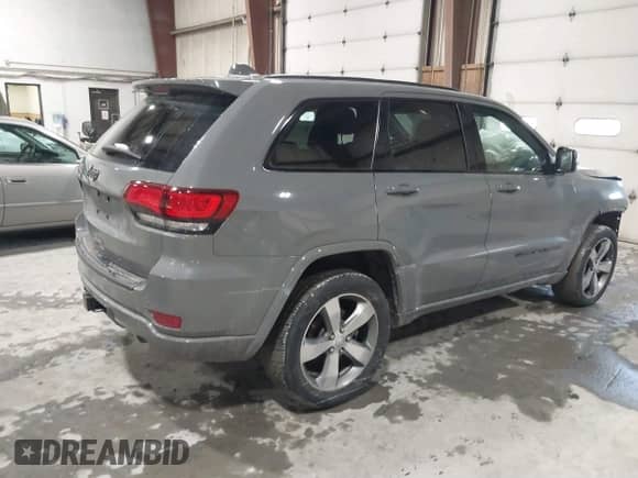 2022 Jeep Grand Cherokee Laredo X with VIN 1C4RJFAG7NC146470, listed as a IAAI auction lot 41482011 with 72,332 mi miles and . Bid and sale history available at DreamBid. Image 4.