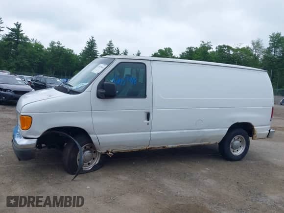 2006 Ford Econoline Cargo with VIN 1FTNE24L16HB43797, listed as a IAAI auction lot 42557448 with 230,514 mi miles and . Bid and sale history available at DreamBid. Image 12.