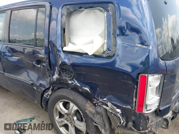 2014 Honda Pilot EX-L with VIN 5FNYF4H78EB021617, listed as a IAAI auction lot 43011573 with 205,499 mi miles and . Bid and sale history available at DreamBid. Image 6.