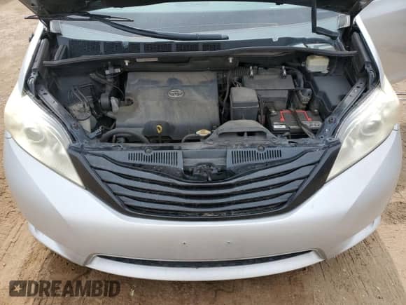 2014 Toyota Sienna L with VIN 5TDZK3DC4ES512274, listed as a Copart auction lot 71258505 with 187,079 mi miles and Clean title. Bid and sale history available at DreamBid. Image 12.