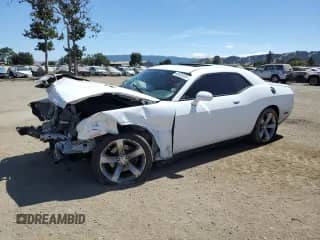 2012 Dodge Challenger R/T with VIN 2C3CDYBT3CH144024, listed as a Copart auction lot 65835555 with 117,366 mi miles and Salvage title. Bid and sale history available at DreamBid. Image 1.