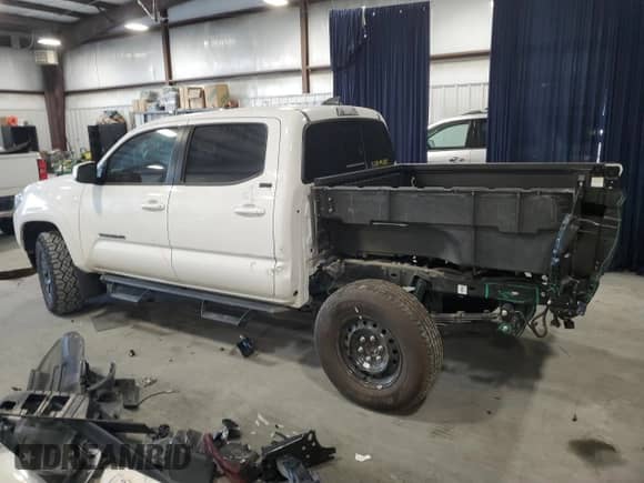 2023 Toyota Tacoma SR5 with VIN 3TYAZ5CN2PT042244, listed as a Copart auction lot 76022534 with 9,551 mi miles and Salvage title. Bid and sale history available at DreamBid. Image 2.