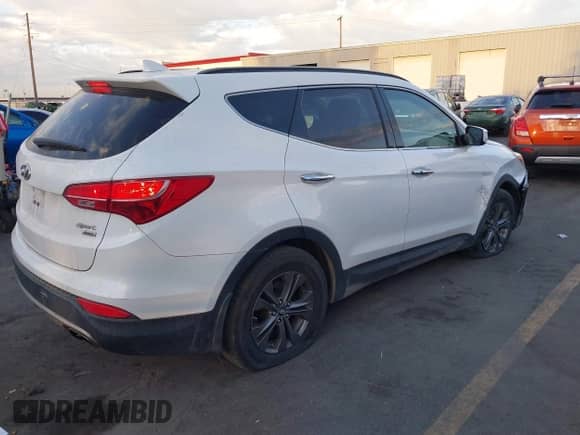 2013 Hyundai Santa Fe Sport z VIN 5XYZUDLBXDG040909, wystawiony jako IAAI lot #43045738 z przebiegiem 163 957 mil mil oraz . Historia ofert i sprzedaży dostępna na DreamBid. Obrazek 4.