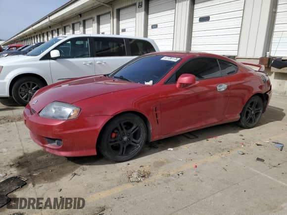 2006 Hyundai Tiburon GT с VIN KMHHN65F86U190230, выставлен на аукционе Copart как лот 47736175 с пробегом 156 991 миль миль и На запчасти • Non repairable. История ставок и продаж доступна на DreamBid. Изображение 1.