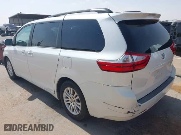 2015 Toyota Sienna XLE with VIN 5TDYK3DC2FS682520, listed as a IAAI auction lot 42501795 with 101,477 mi miles and . Bid and sale history available at DreamBid. Image 3.