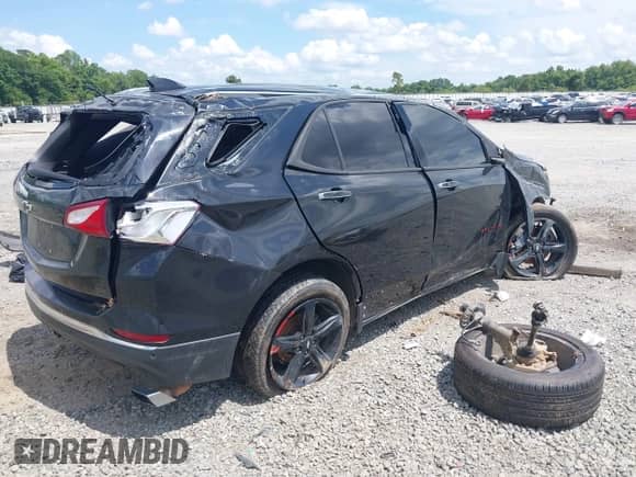 2020 Chevrolet Equinox Premier with VIN 2GNAXPEX9L6153106, listed as a IAAI auction lot 42548871 with 105,519 mi miles and . Bid and sale history available at DreamBid. Image 4.