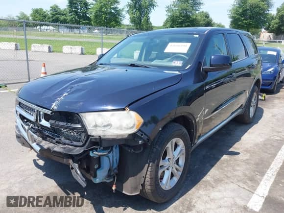 2011 Dodge Durango Express with VIN 1D4RE2GG8BC653980, listed as a IAAI auction lot 42656590 with 159,780 mi miles and . Bid and sale history available at DreamBid. Image 2.