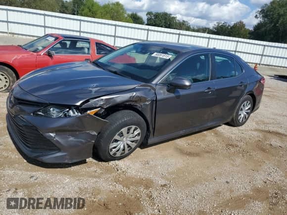 2019 Toyota Camry Hybrid LE с VIN 4T1B31HK6KU509349, выставлен на аукционе Copart как лот 90061815 с пробегом 76 314 миль миль и Списание • Salvage title. История ставок и продаж доступна на DreamBid. Изображение 1.