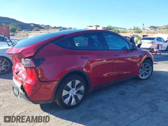 2021 Tesla Model Y Long Range with VIN 5YJYGDEE8MF203817, listed as a IAAI auction lot 43469412 with 41,471 mi miles and . Bid and sale history available at DreamBid. Image 14.