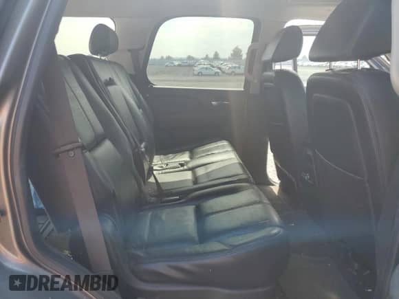 2007 Chevrolet Tahoe LTZ z VIN 1GNFK13087R404618, wystawiony jako Copart lot #71642725 z przebiegiem 219 920 mil mil oraz Szkoda całkowita • Salvage title. Historia ofert i sprzedaży dostępna na DreamBid. Obrazek 11.