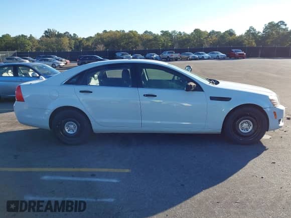 2014 Chevrolet Caprice Police Police with VIN 6G3NS5U25EL950405, listed as a IAAI auction lot 43474434 with 61,164 mi miles and . Bid and sale history available at DreamBid. Image 13.