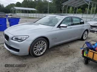 2014 BMW 7 Series ALPINA B7 with VIN WBAYE8C57ED134785, listed as a Copart auction lot 67736745 with 82,835 mi miles and Salvage title. Bid and sale history available at DreamBid. Image 1.