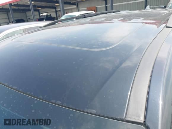 2021 Chevrolet Traverse Premier with VIN 1GNEVKKW6MJ245896, listed as a IAAI auction lot 42573984 with 56,484 mi miles and . Bid and sale history available at DreamBid. Image 19.