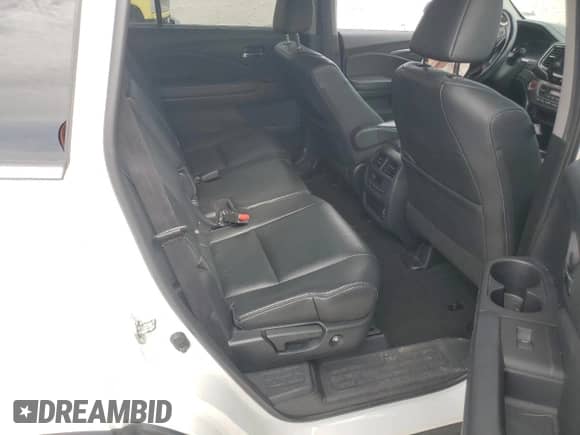 2020 Honda Pilot EX-L z VIN 5FNYF6H50LB060421, wystawiony jako Copart lot #80111525 z przebiegiem 58 305 mil mil oraz Szkoda całkowita • Salvage title. Historia ofert i sprzedaży dostępna na DreamBid. Obrazek 11.