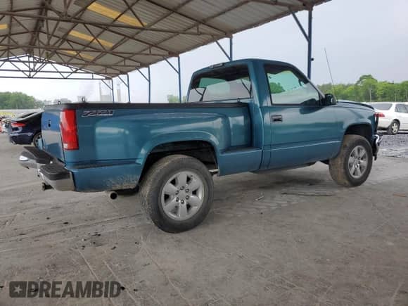 1997 GMC Sierra 1500 с VIN 1GTEK14R2VZ514577, выставлен на аукционе Copart как лот 54443015 с пробегом 214 823 миль миль и Списание • Salvage title. История ставок и продаж доступна на DreamBid. Изображение 3.