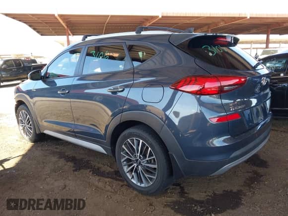 2021 Hyundai Tucson SEL with VIN KM8J3CAL3MU293585, listed as a IAAI auction lot 43319933 with 58,076 mi miles and . Bid and sale history available at DreamBid. Image 3.