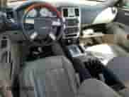 2005 Chrysler 300 C with VIN 2C3JA63H85H679092, listed as a Copart auction lot 70284705 with 191,335 mi miles and Salvage title. Bid and sale history available at DreamBid. Image 8.