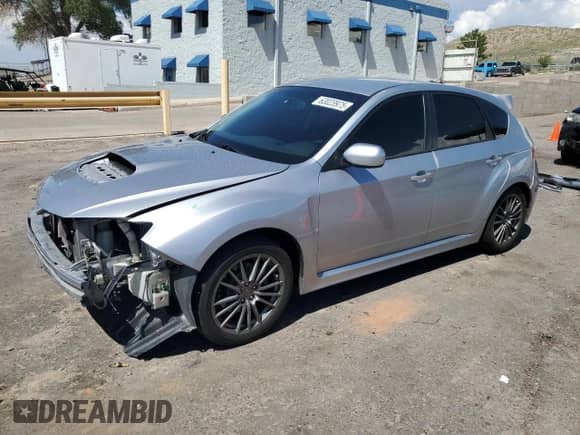 2014 Subaru WRX WRX with VIN JF1GR7E69EG233714, listed as a Copart auction lot 63023975 with 142,780 mi miles and Salvage title. Bid and sale history available at DreamBid. Image 1.
