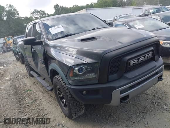 2017 Ram 1500 Rebel z VIN 1C6RR7YT1HS539870, wystawiony jako IAAI lot #42755780 z przebiegiem 109 690 mil mil oraz . Historia ofert i sprzedaży dostępna na DreamBid. Obrazek 1.
