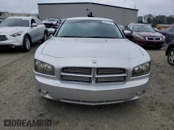 2010 Dodge Charger SXT с VIN 2B3CA3CV5AH146914, выставлен на аукционе Copart как лот 72917494 с пробегом 103 931 миль миль и Списание • Salvage title. История ставок и продаж доступна на DreamBid. Изображение 5.